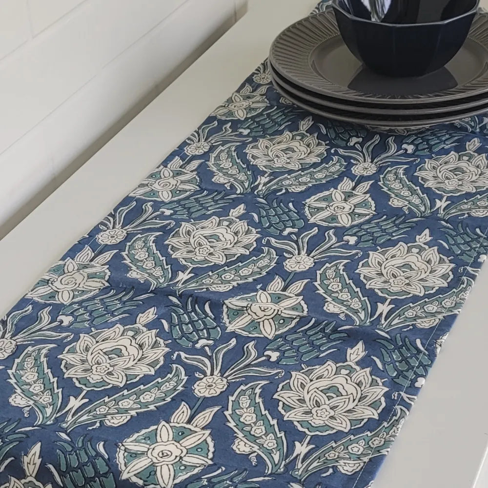 Stormy Skies Runner by The Yard House in bold cobalt blue, available in 4, 6, or 8 seater sizes with abstract nature-inspi...