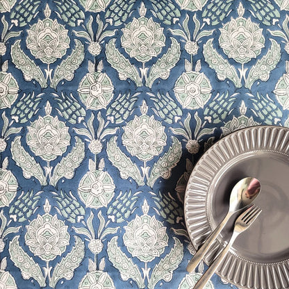 Stormy Skies Tablecloth by The Yard House in bold blue, featuring abstract patterns, available in round, square, and recta...