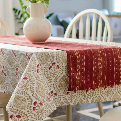 Sweet Almond Tablecloth by The Yard House in brown and peach, featuring geometric patterns, available in various sizes.