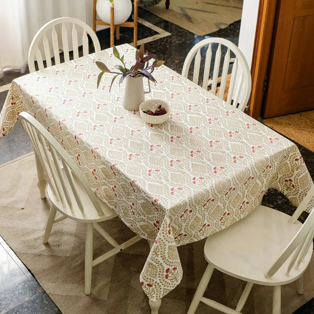 Sweet Almond Tablecloth by The Yard House in brown and peach, featuring geometric patterns, available in various sizes.