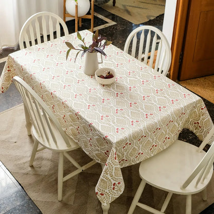 Sweet Almond Tablecloth by The Yard House in brown and peach, featuring geometric patterns, available in various sizes.
