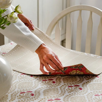 Sweet Almond Tablecloth by The Yard House in brown and peach, featuring geometric patterns, available in various sizes.