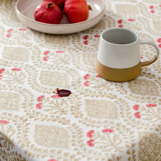 Sweet Almond Tablecloth by The Yard House in brown and peach, featuring geometric patterns, available in various sizes.