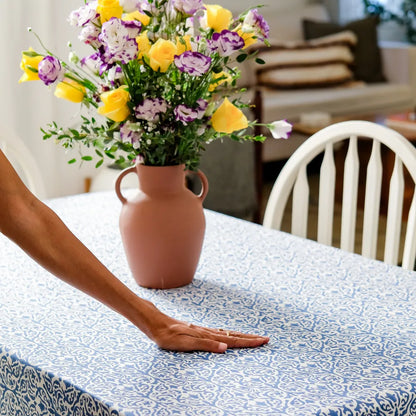 Whispers of the Sea Tablecloth by The Yard House in blue, 4-seater rectangular (48”x72”), featuring bold abstract patterns...
