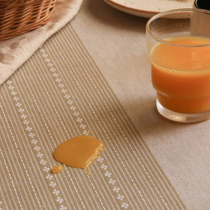 Woven Desert Sand Tablecloth by The Yard House in neutral tones, available in square, round, and rectangle sizes. Perfect ...