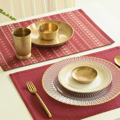Woven Ruby Red Placemats by The Yard House, set of 4 rectangular (12" x 17"), featuring bold colors and geometric patterns.