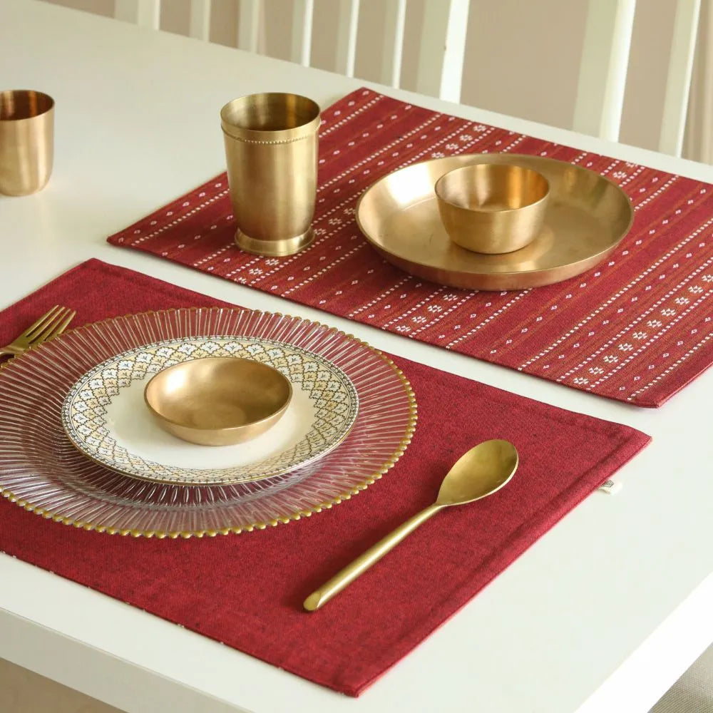 Woven Ruby Red Placemats by The Yard House, set of 4 rectangular (12" x 17"), featuring bold colors and geometric patterns.